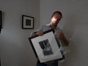 Michael Glenister unpacking work
